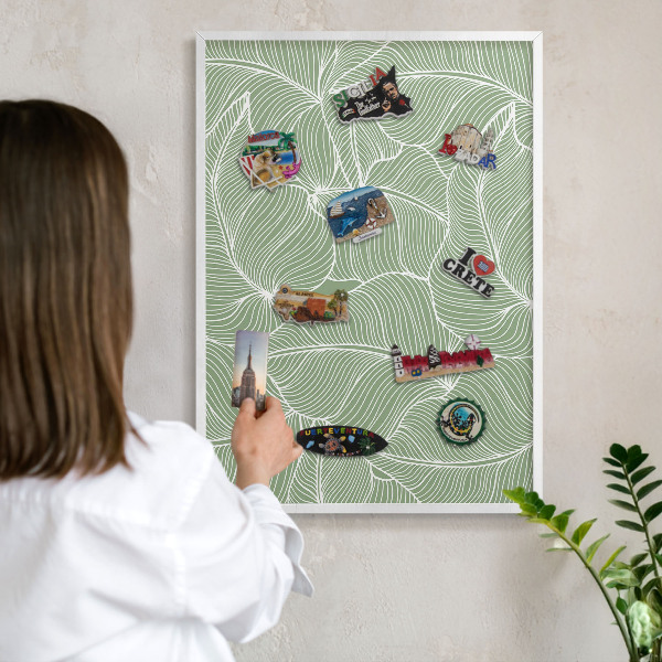 Tableau mural pour aimants dans un cadre noir Feuilles tropicales