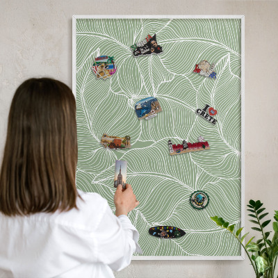 Tableau mural pour aimants dans un cadre noir Feuilles tropicales