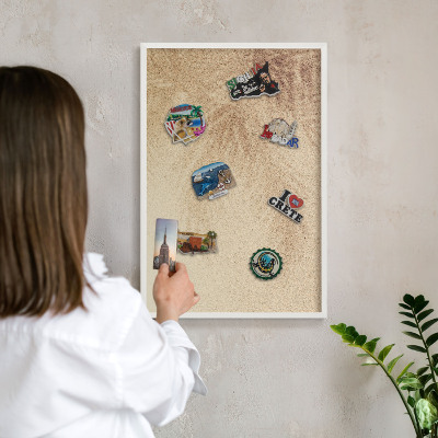 Tableau mural pour aimants dans un cadre noir Feuilles de sable