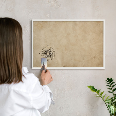 Tableau mural pour aimants dans un cadre noir Rose des vents