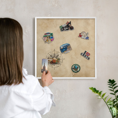 Tableau mural pour aimants dans un cadre noir Rose des vents