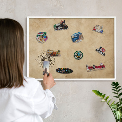 Tableau mural pour aimants dans un cadre noir Rose des vents