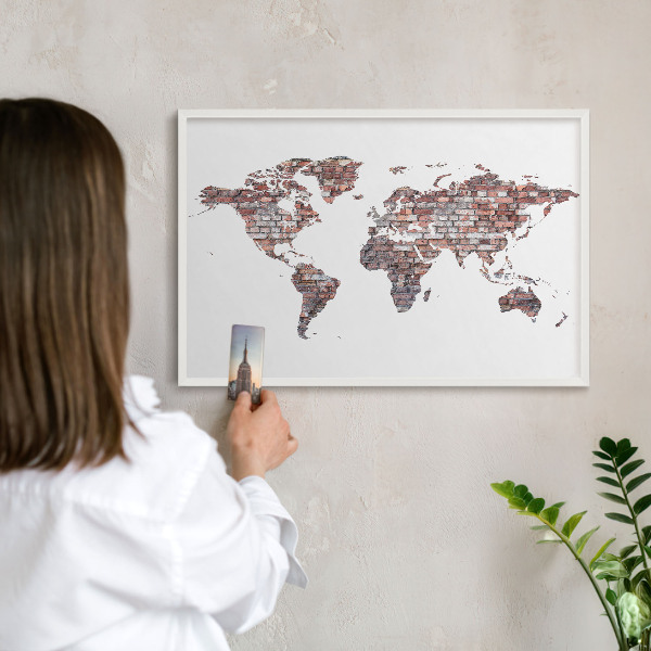 Tableau mural pour aimants dans un cadre noir Le monde de briques