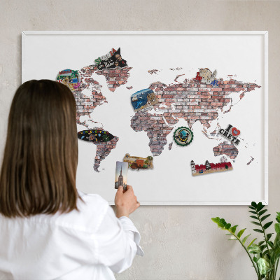 Tableau mural pour aimants dans un cadre noir Le monde de briques