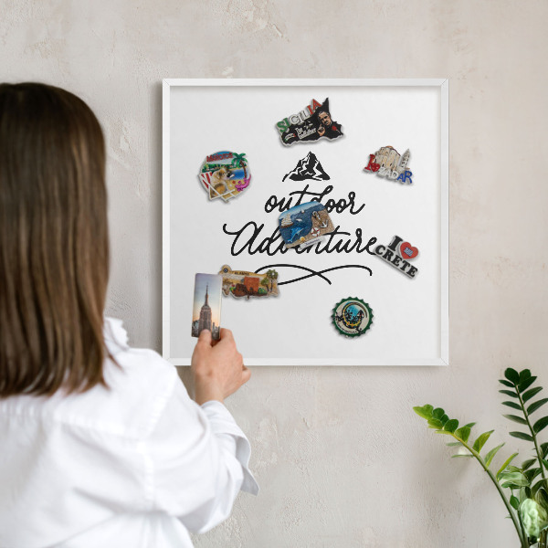 Tableau mural pour aimants dans un cadre noir Aventure en montagne