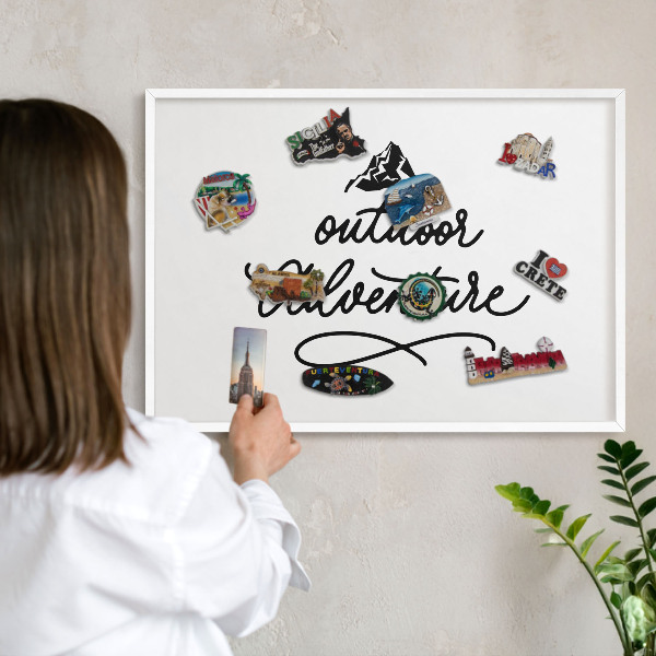 Tableau mural pour aimants dans un cadre noir Aventure en montagne