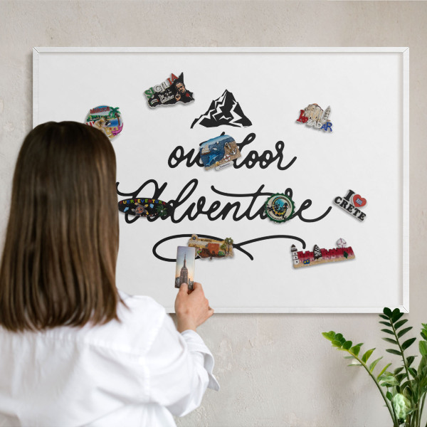 Tableau mural pour aimants dans un cadre noir Aventure en montagne