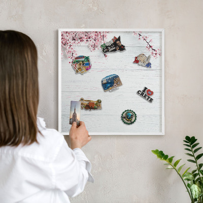 Tableau mural pour aimants dans un cadre noir Élégance épanouie