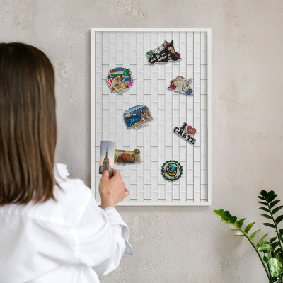 Tableau mural pour aimants dans un cadre noir Briques blanches