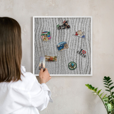 Tableau mural pour aimants dans un cadre noir Vagues grises