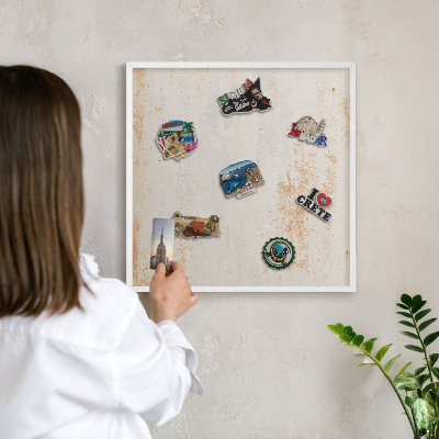 Tableau mural pour aimants dans un cadre noir Texture rouillée