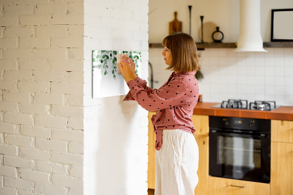 Tableau magnétique effaçable Feuilles vertes et photos sur le mur