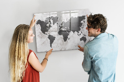 Tableau magnétique effaçable Une carte du monde remplie de souvenirs et de notes
