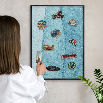 Tableau magnétique encadré de couleur noire Vagues bleues