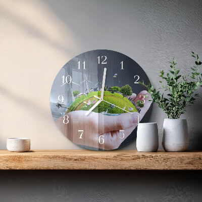 Horloge ronde Main Terre