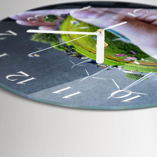 Horloge ronde Main Terre
