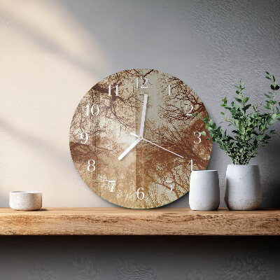 Horloge ronde cimes des arbres