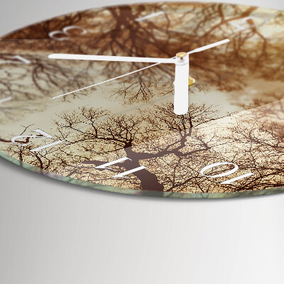 Horloge ronde cimes des arbres